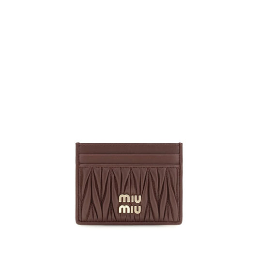 Cardholder Wallet by Miu Miu for women in nappa lamb leather bordeaux showcases a discerning silhouette, artfully capturing the essence of Nappa Lamb Leather Cardholder Wallet with its functional card-organization compact-design.