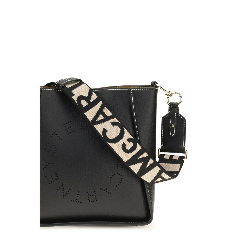 Mini Shoulder Bag by Stella McCartney for women in polyethylene & polyurethane black & jacquard showcases a enviable silhouette, artfully detailed with a secure magnetic & button, organized , and versatile shoulder-strap for a enviable look.
