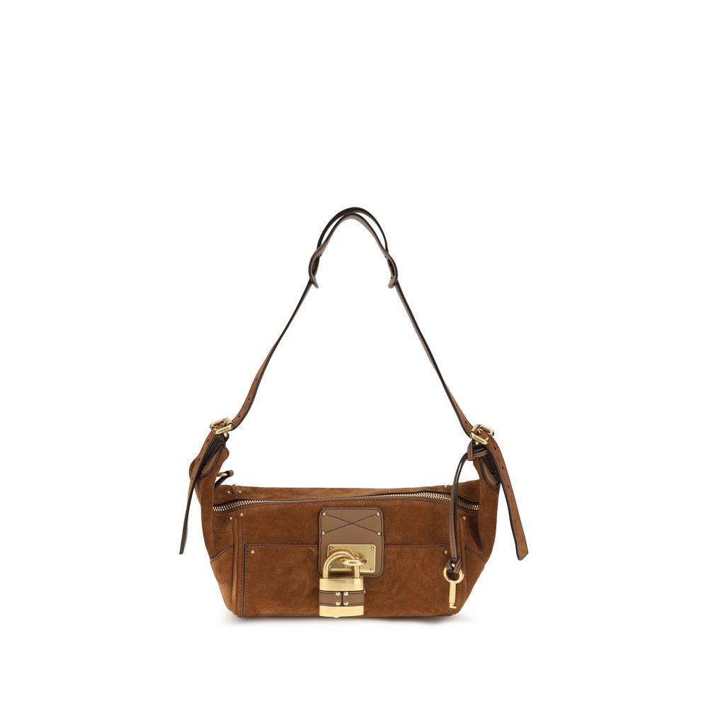 Micro Shoulder Bag by Chloé for women in bos taurus calf nappa & suede leather brown, gold & signature features an effortlessly chic silhouette with a secure zipper & buckle, ample external-pockets, and versatile shoulder-strap & adjustable-strap for effortlessly chic everyday luxury.
