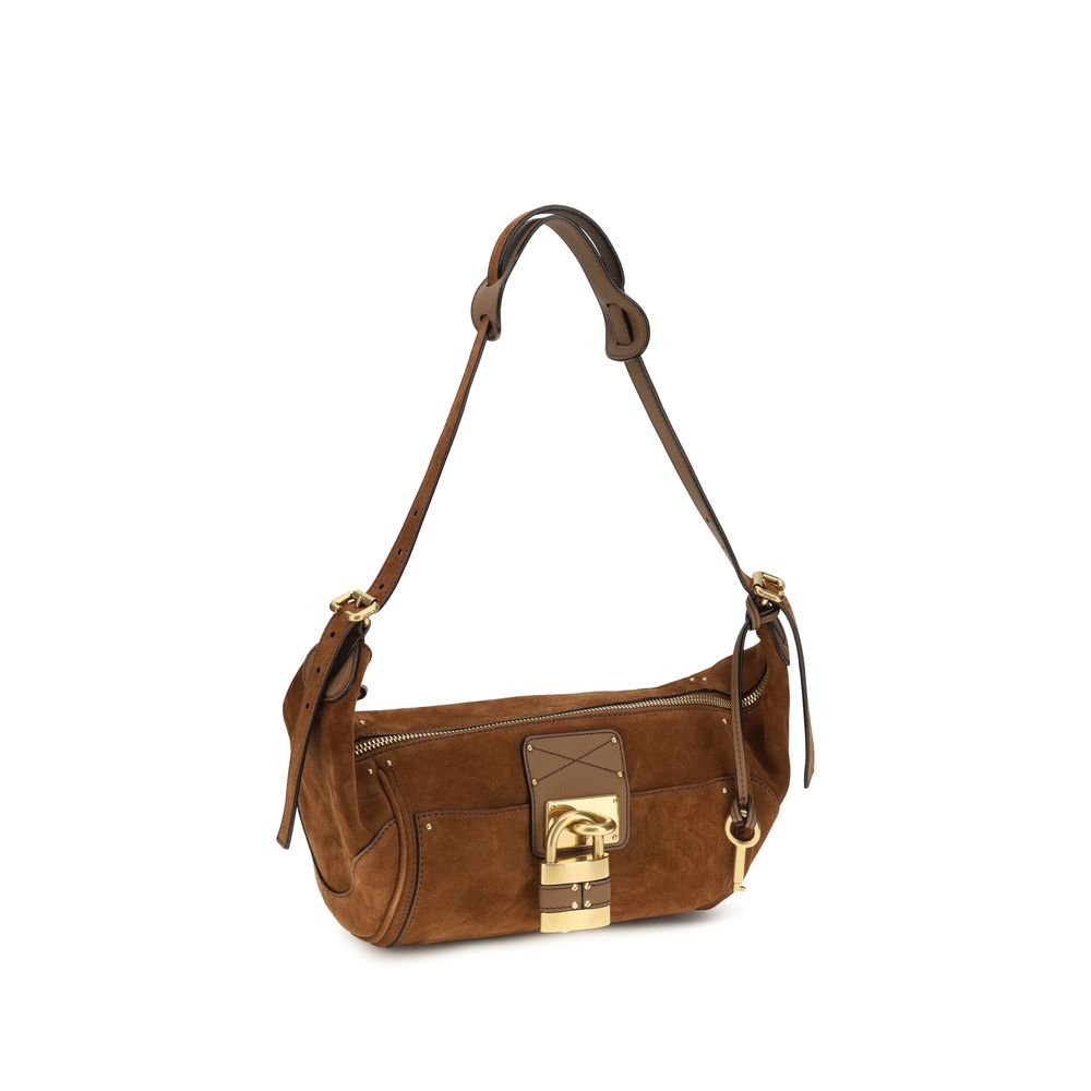 Micro Shoulder Bag by Chloé for women in bos taurus calf nappa & suede leather brown, gold & signature features a effortless sophistication silhouette, secured by a zipper & buckle with ample external-pockets and versatile shoulder-strap & adjustable-strap for a effortless sophistication finish.