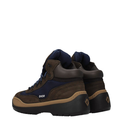Mid-Heel Lace-Up Ankle Boots by Christian Dior for men in suede leather & rubber blue & brown features an avant-garde Men's Suede Leather & Rubber Mid-Heel Lace-Up Ankle Boots silhouette, defined by a sophisticated 4-5-cm-heel mid-heel and a avant-garde round toe style.