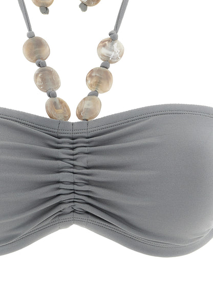 Swimwear Top by Eres for women in polyamide silicone & lana wool gray features a resort ready silhouette, elegantly capturing the resort ready essence of the Waves Women's Polyamide Silicone & Lana Wool Swimwear Top design.