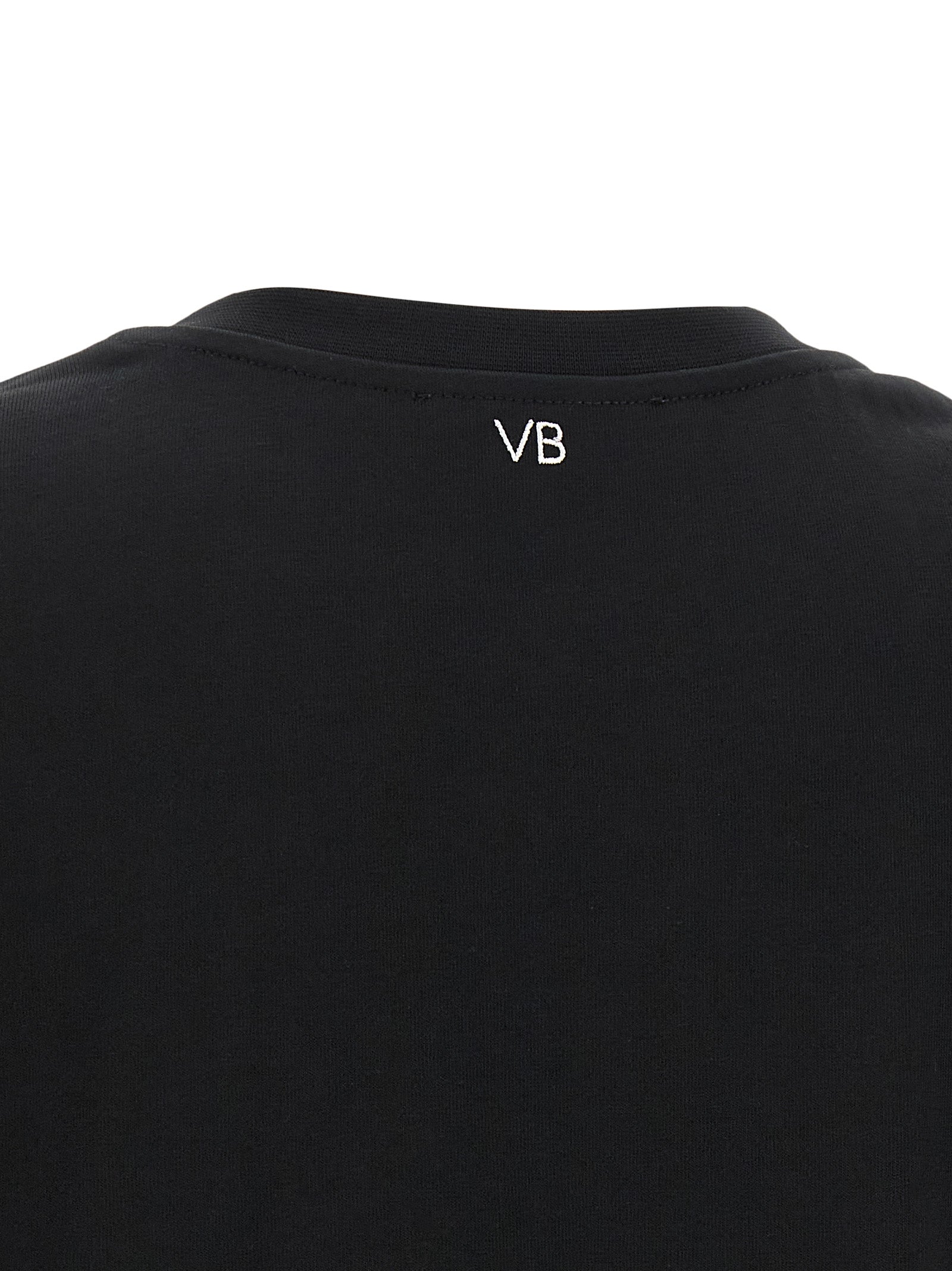 T-Shirt by Victoria Beckham for women in cotton black, white & monogram showcases a dramatic silhouette, elegantly detailed with a dramatic and for a truly dramatic finish.