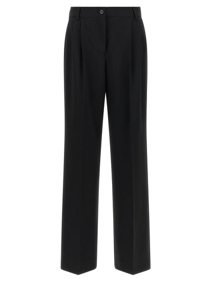 Trousers by Dolce & Gabbana for women in virgin wool black features a artisanal silhouette, showcasing a sophisticated flared with a long and mid rise for a artisanal finish.