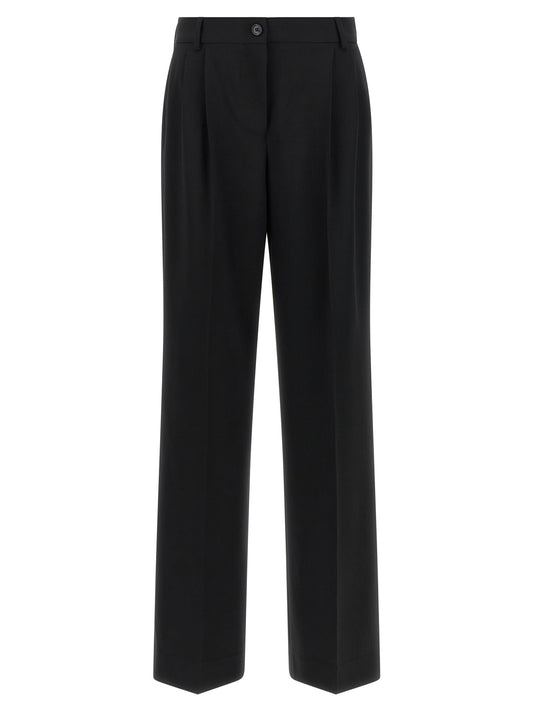 Trousers by Dolce & Gabbana for women in virgin wool black features a artisanal silhouette, showcasing a sophisticated flared with a long and mid rise for a artisanal finish.