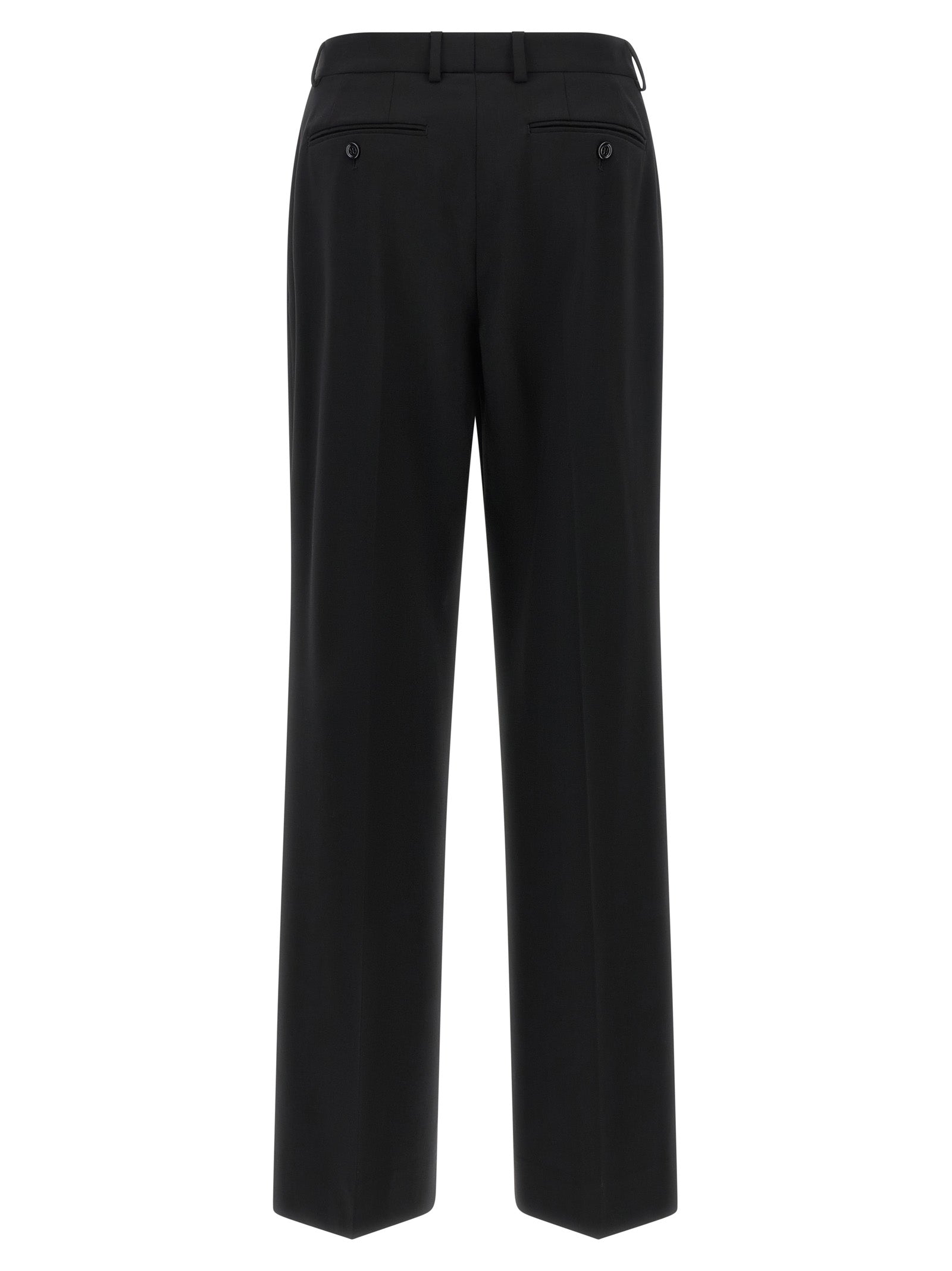 Trousers by Dolce & Gabbana for women in virgin wool black presents a smart silhouette, meticulously detailed with a smart flared, a smart long, and a smart mid rise.