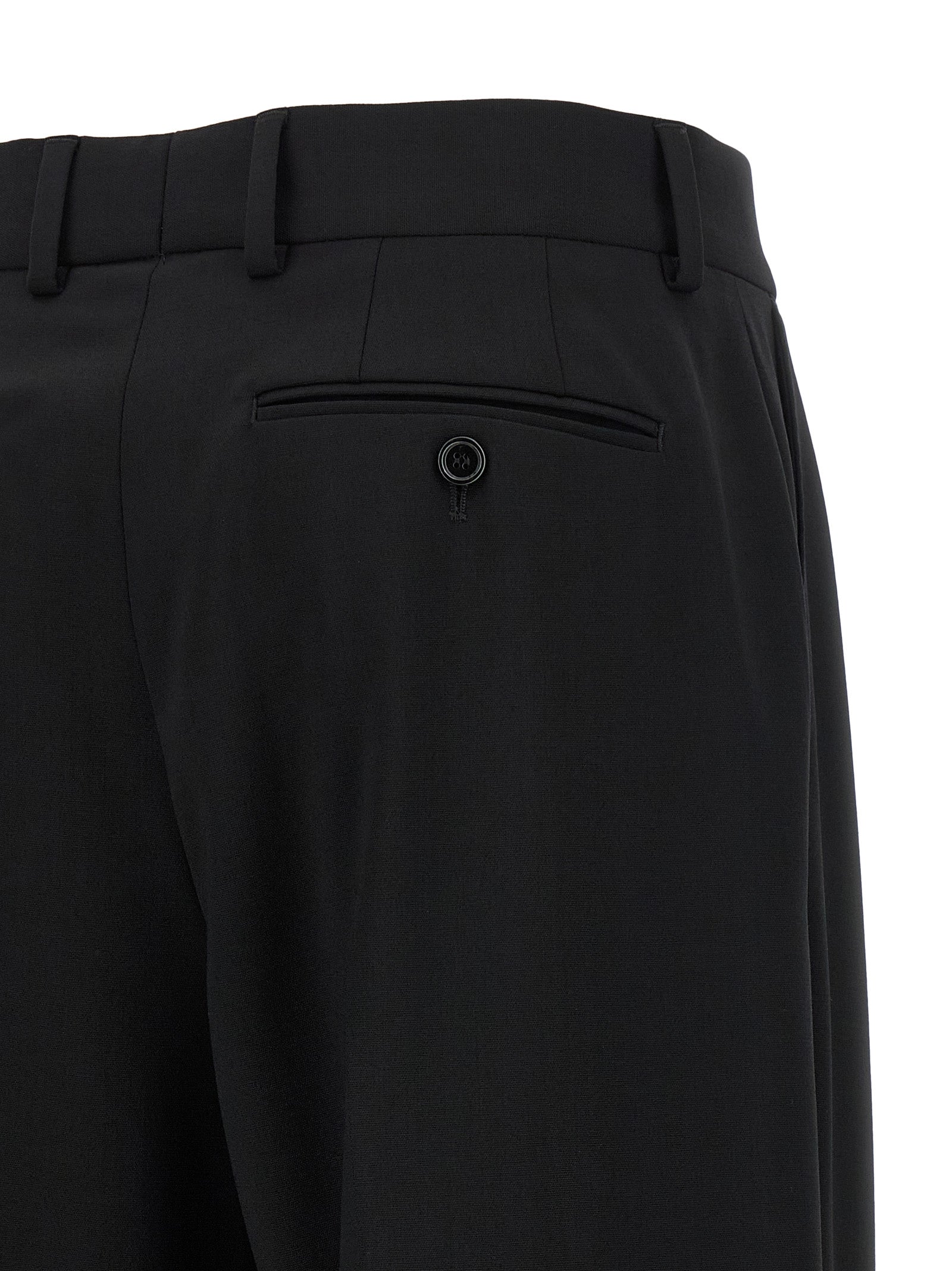 Trousers by Dolce & Gabbana for women in virgin wool black features an sartorial silhouette, showcasing a precise flared and long with a sartorial mid rise for a refined look.