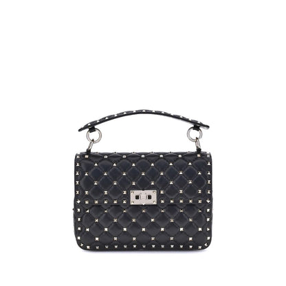 Small Quilted Crossbody Flap Handbag by Valentino Garavani for women in nappa lambskin leather black & signature features a signature silhouette, showcasing a secure flap and signature with versatile crossbody-strap, adjustable-strap & handle for a sophisticated look.