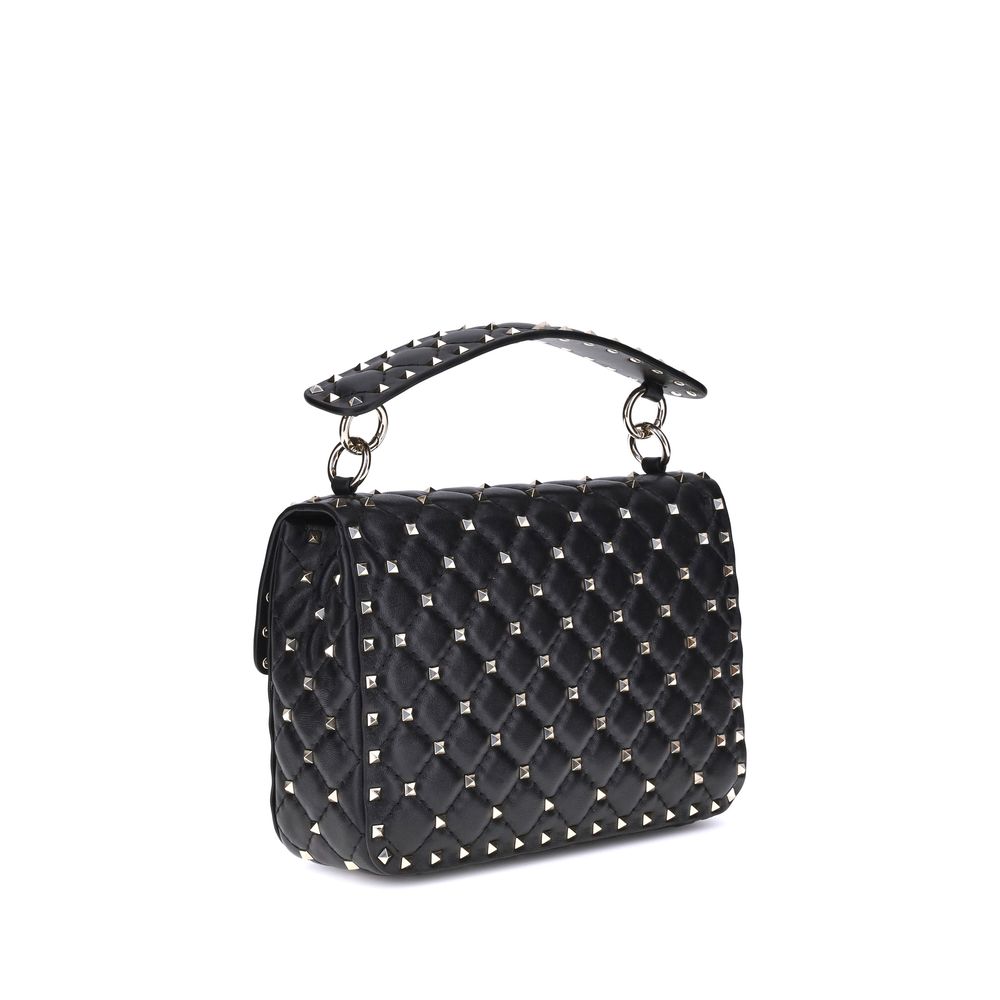 Small Quilted Crossbody Flap Handbag by Valentino Garavani for women in nappa lambskin leather black & signature features a refined silhouette, showcasing a secure flap, organized , and versatile crossbody-strap, adjustable-strap & handle for a refined finish.