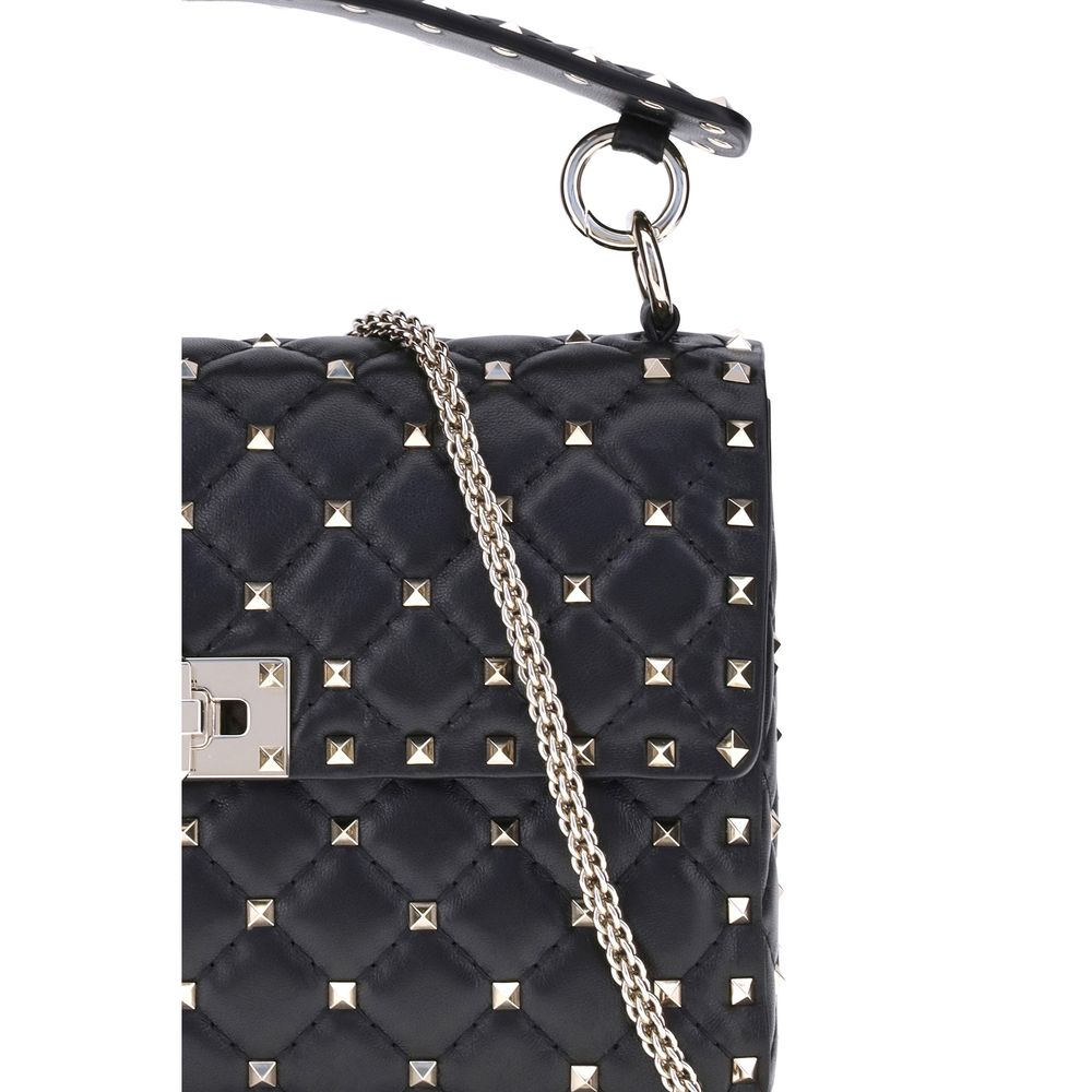 Small Quilted Crossbody Flap Handbag by Valentino Garavani for women in nappa lambskin leather black & signature features a contemporary silhouette, showcasing a secure flap, ample , and contemporary crossbody-strap, adjustable-strap & handle for a sophisticated look.