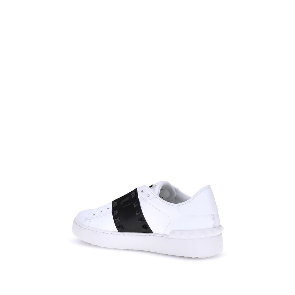 Sneakers by Valentino Garavani for women in bos taurus calfskin leather white presents a sumptuous silhouette, artfully capturing the essence of the Rockstud Women's Low Top Bos Taurus Calfskin Leather Sneakers with its sumptuous low-top style design.