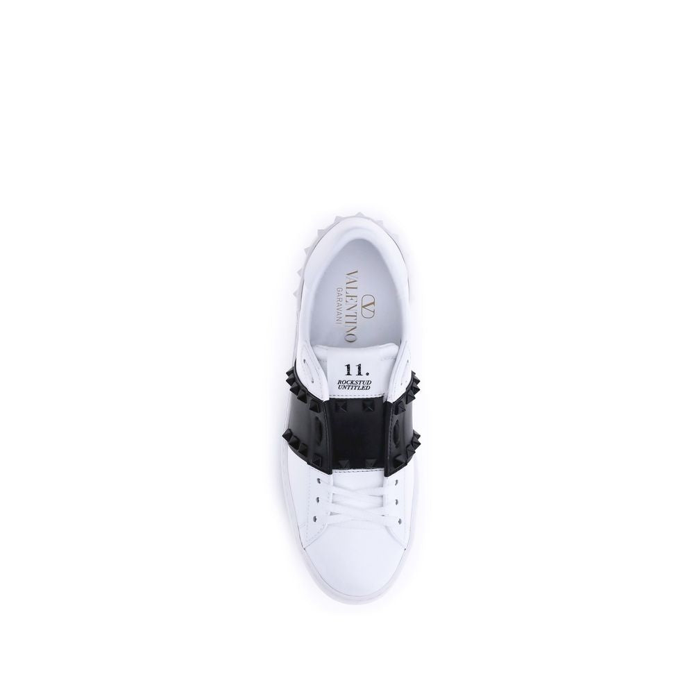 Sneakers by Valentino Garavani for women in bos taurus calfskin leather white features a chic design, perfectly showcasing the chic low-top style of this Rockstud Women's Low Top Bos Taurus Calfskin Leather Sneakers.