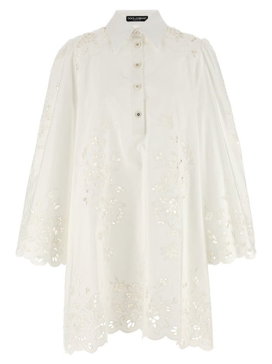Dress by Dolce & Gabbana for women in cotton polyester white showcases a striking silhouette, elegantly detailed with a , refined , and a striking short for a striking finish.