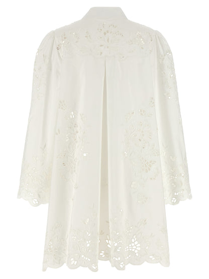 Dress by Dolce & Gabbana for women in cotton polyester white features a dramatic silhouette, showcasing an elegant and that flows into a dramatic short.