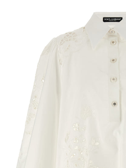 Dress by Dolce & Gabbana for women in cotton polyester white presents a sinuous silhouette, showcasing a sophisticated and detailed with a sinuous short for a refined finish.
