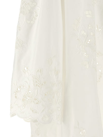 Dress by Dolce & Gabbana for women in cotton polyester white features an cute silhouette, detailed with a and that elegantly flows into a cute short.