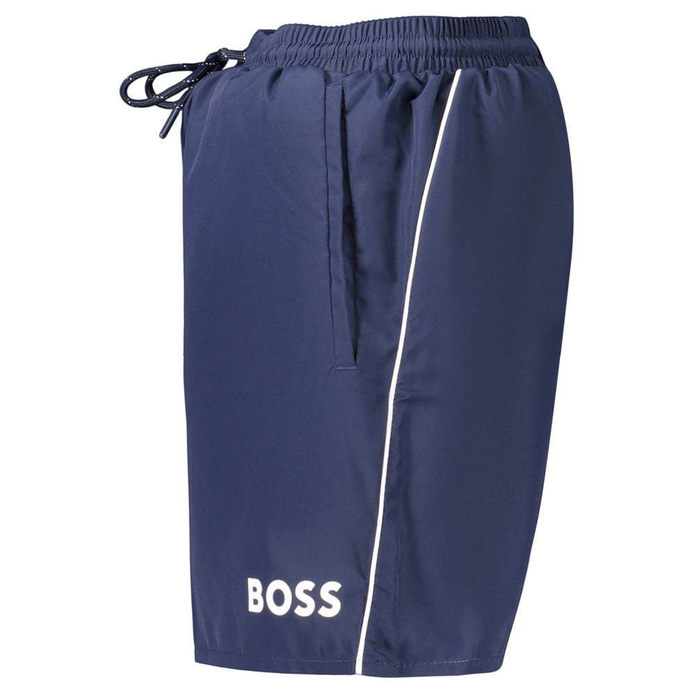 Swim Shorts by Hugo Boss for men in polyester blue & print presents a sculptural silhouette, showcasing the sculptural Waves Men's Polyester Swim Shorts design with a refined cut for a premium, sophisticated look.