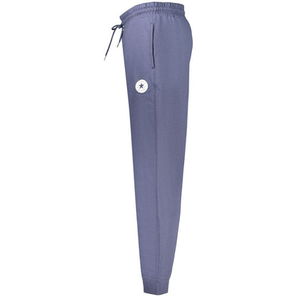 Joggers by Converse for men in cotton polyester blue presents a refined pantology silhouette, artfully defined by a refined pantology regular-fit, long, and a sophisticated .
