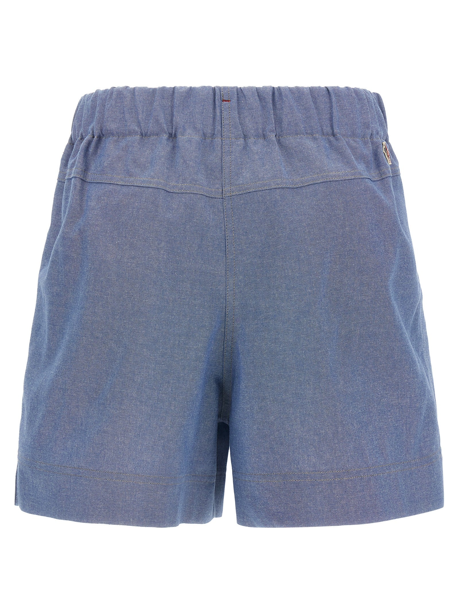 Bermuda Shorts by Moncler Grenoble for women in cotton light-blue & signature showcases a on trend silhouette, featuring a tailored wide with a classic short and sophisticated for a on trend finish.