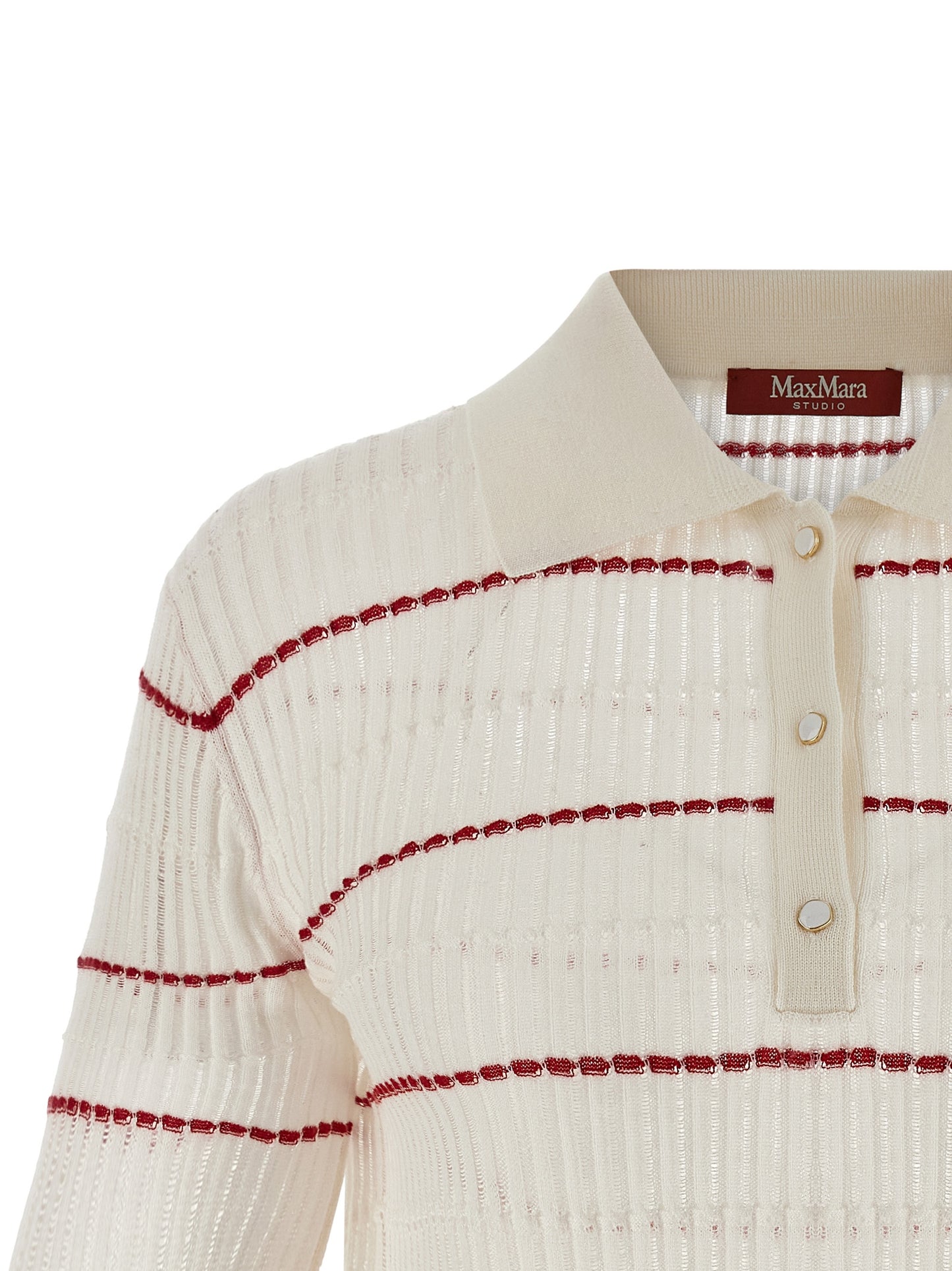 This Polo Shirt by Max Mara for women in wool & silk white & patterned presents a flawless silhouette, showcasing flawless detailing and a refined for a truly flawless aesthetic.