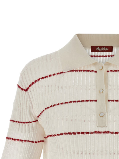 This Polo Shirt by Max Mara for women in wool & silk white & patterned presents a flawless silhouette, showcasing flawless detailing and a refined for a truly flawless aesthetic.