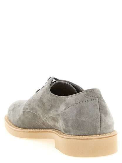 This Derby Lace-Up Shoes by Brunello Cucinelli for men in calf leather & rubber gray features an exquisite silhouette from the Men's Calf Leather & Rubber Derby Lace-Up Shoes collection, defined by a sophisticated and elegant .