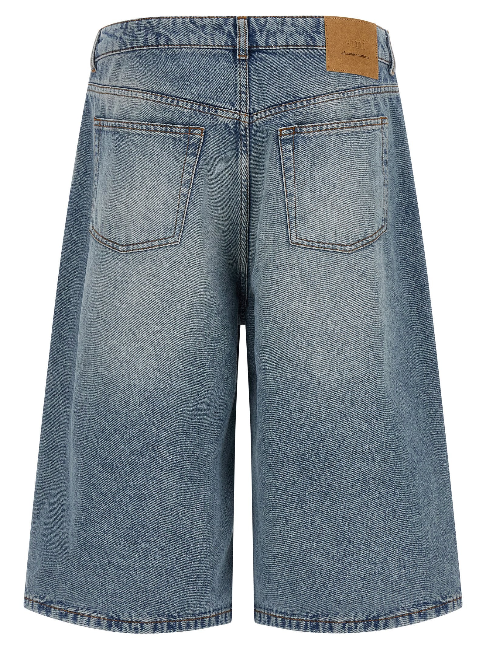 Denim Shorts by Ami Paris for men in cotton denim blue features an magnificent silhouette, showcasing a magnificent flared & wide with a short and for a premium, sophisticated aesthetic.