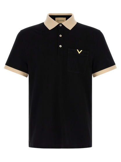 Polo Shirt by Valentino Garavani for men in cotton bicolour, black & white presents a distinguished silhouette, showcasing a sophisticated and distinguished short-sleeve for a truly distinguished finish.