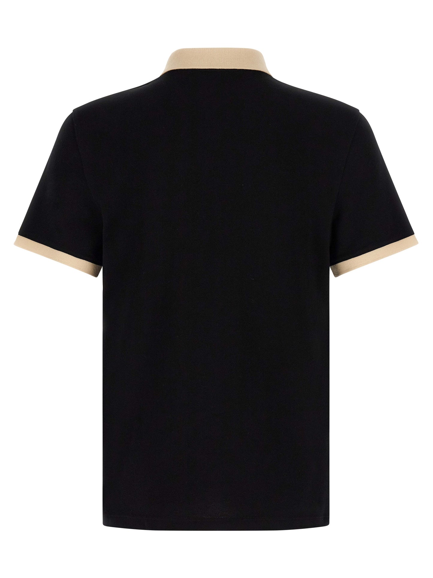 This Polo Shirt by Valentino Garavani for men in cotton bicolour, black & white presents a flawless silhouette, showcasing flawless detailing and a refined for a truly flawless aesthetic.