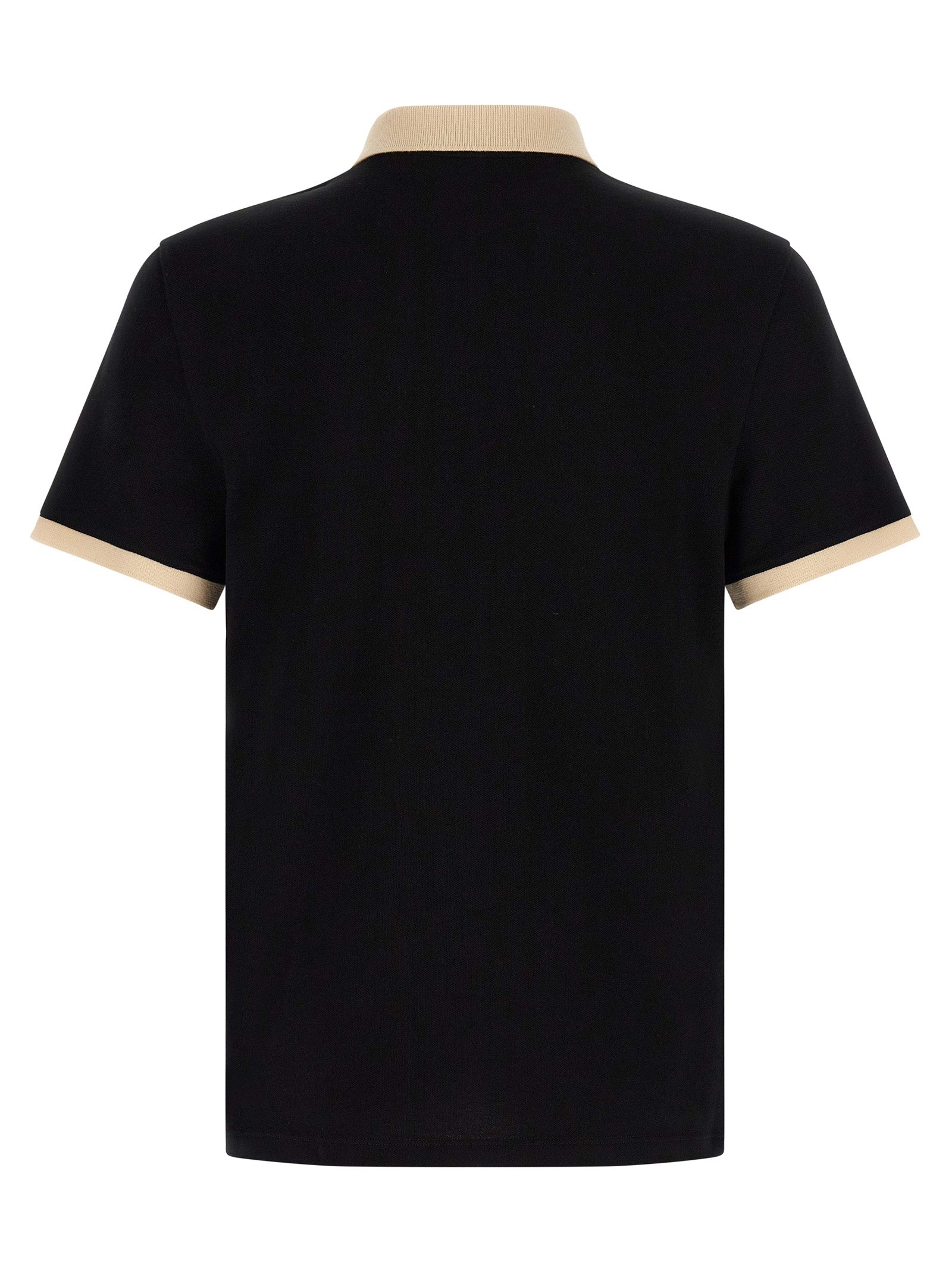 This Polo Shirt by Valentino Garavani for men in cotton bicolour, black & white presents a flawless silhouette, showcasing flawless detailing and a refined for a truly flawless aesthetic.