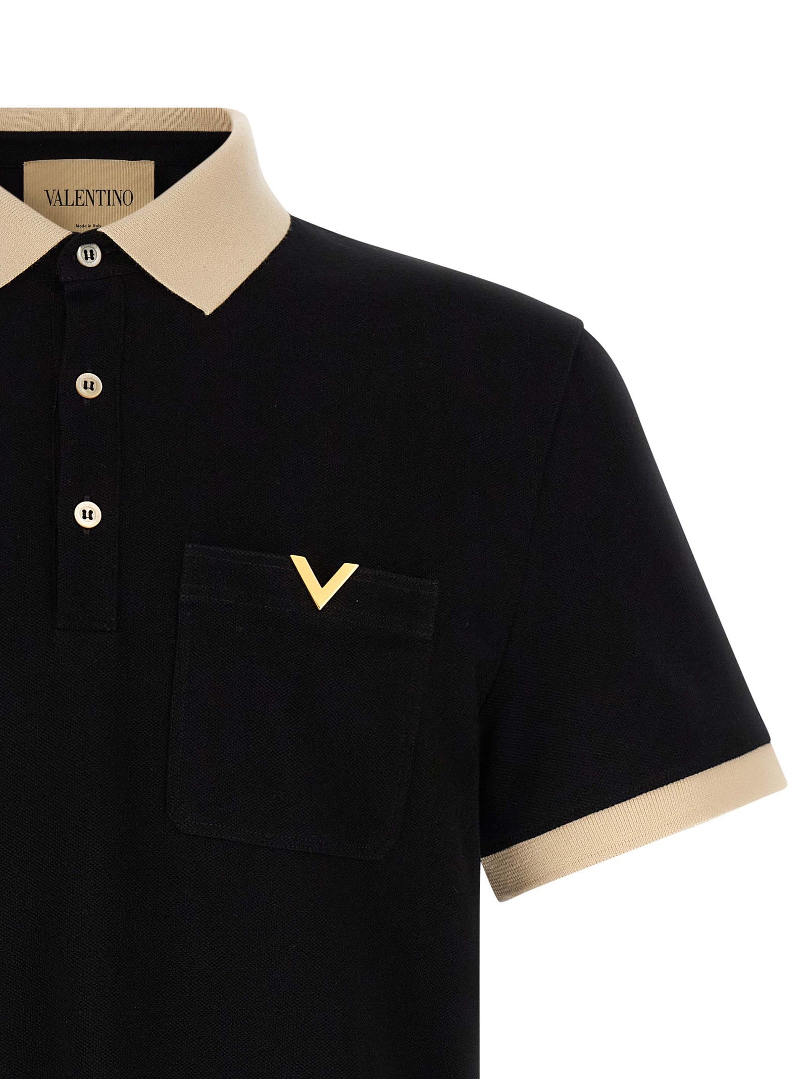 Polo Shirt by Valentino Garavani for men in cotton bicolour, black & white presents a sleek silhouette, featuring a refined and for a sleek finish.
