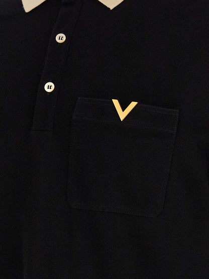 Polo Shirt by Valentino Garavani for men in cotton bicolour, black & white presents a crisp silhouette, artfully detailed with a crisp and crisp .