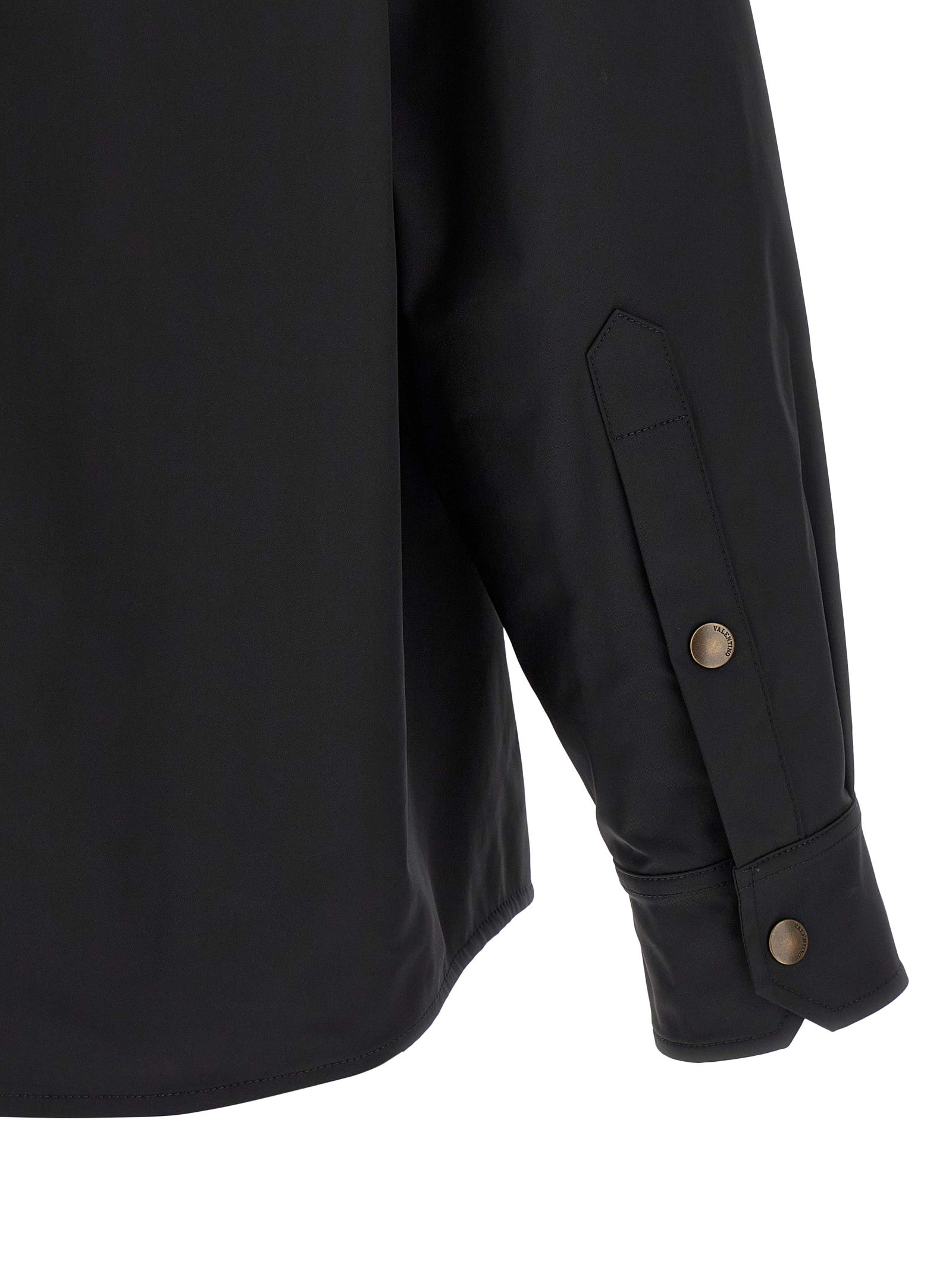 Jacket by Valentino Garavani for men in stretch polyester & nylon black features a smart silhouette, perfectly accentuated by its unique and functional pockets for a smart finish.