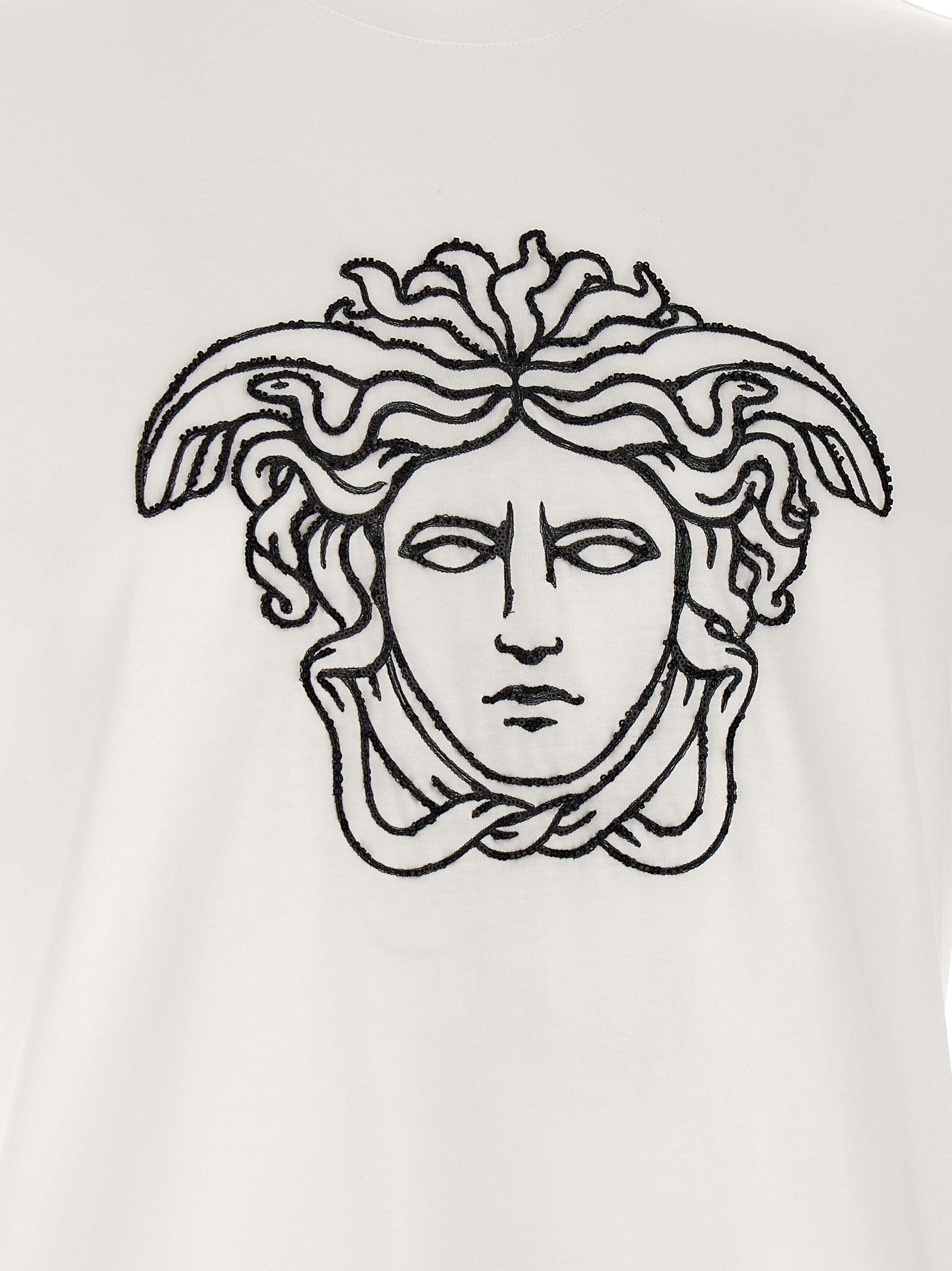 T-Shirt by Versace for men in cotton bicolour, black & white features an on trend silhouette, perfectly showcasing a on trend and crew neckline for an elevated aesthetic.