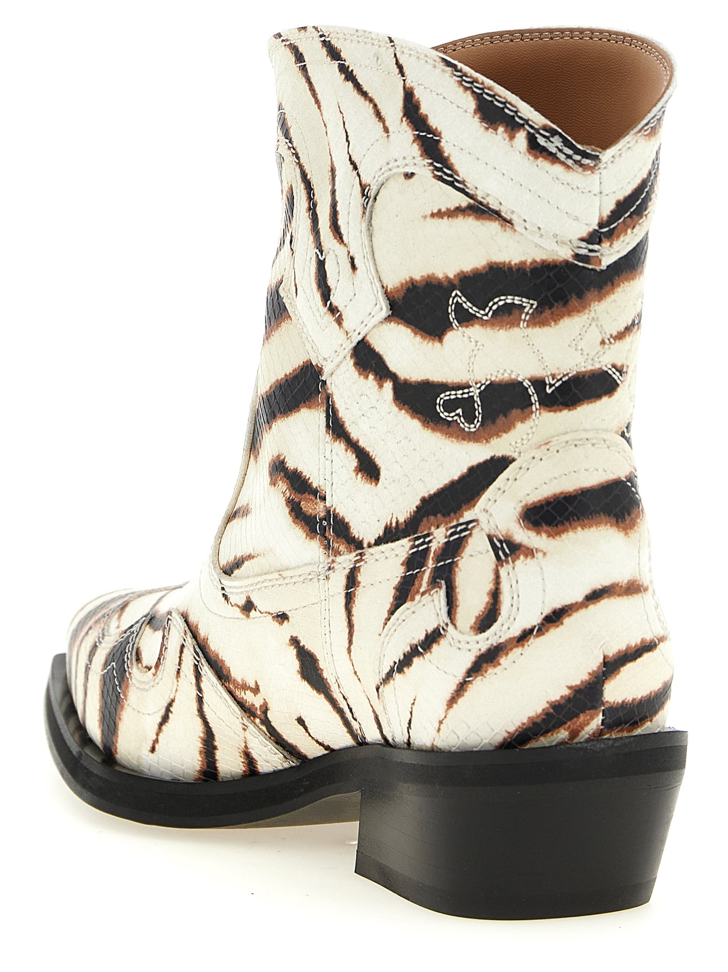 Cuban Ankle Chelsea Cowboy Boots by Ganni for women in polyester & polyurethane beige, zebra, patterned & print features an high-performance silhouette, showcasing the sophisticated design of the Women's Polyester & Polyurethane Cuban Ankle Chelsea Cowboy Boots with a cuban-heel and a refined pointed toe style.