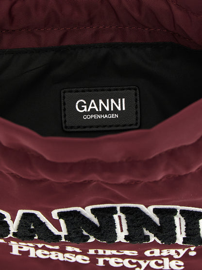 Bucket Pouch Clutch Handbag by Ganni for women in polyamide leather bordeaux & silver showcases a sculptural silhouette, featuring a secure , ample , and versatile for a sculptural finish.