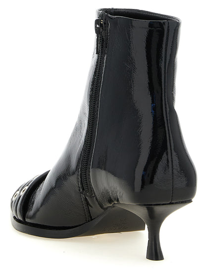 Kitten Ankle Boots by Ganni for women in polyethylene polyurethane cotton & leather black & silver showcases a ergonomic silhouette from the Women's Polyethylene Polyurethane Cotton & Leather Kitten Ankle Boots collection, featuring a ergonomic kitten-heel and a ergonomic pointed toe style.