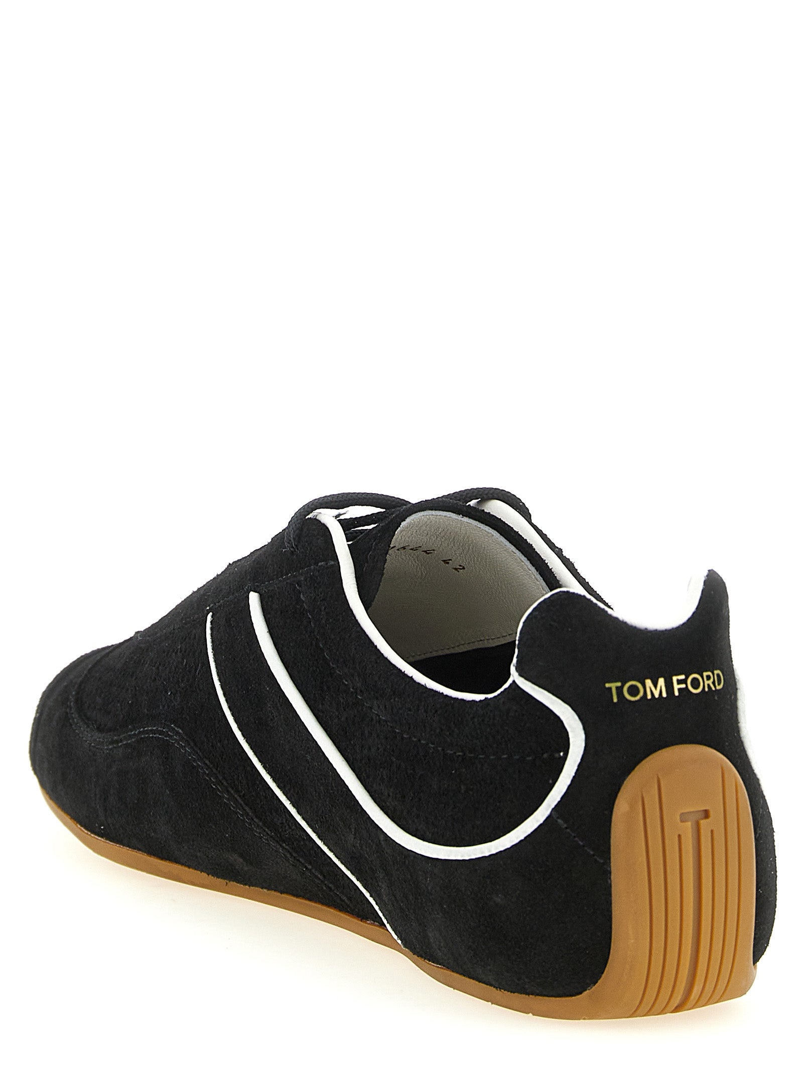 Sneakers by Tom Ford for men in suede calfskin leather & polyester bicolour, black & white presents a sumptuous silhouette, artfully capturing the essence of the Men's Fashion Suede Calfskin Leather & Polyester Sneakers with its sumptuous fashion style design.