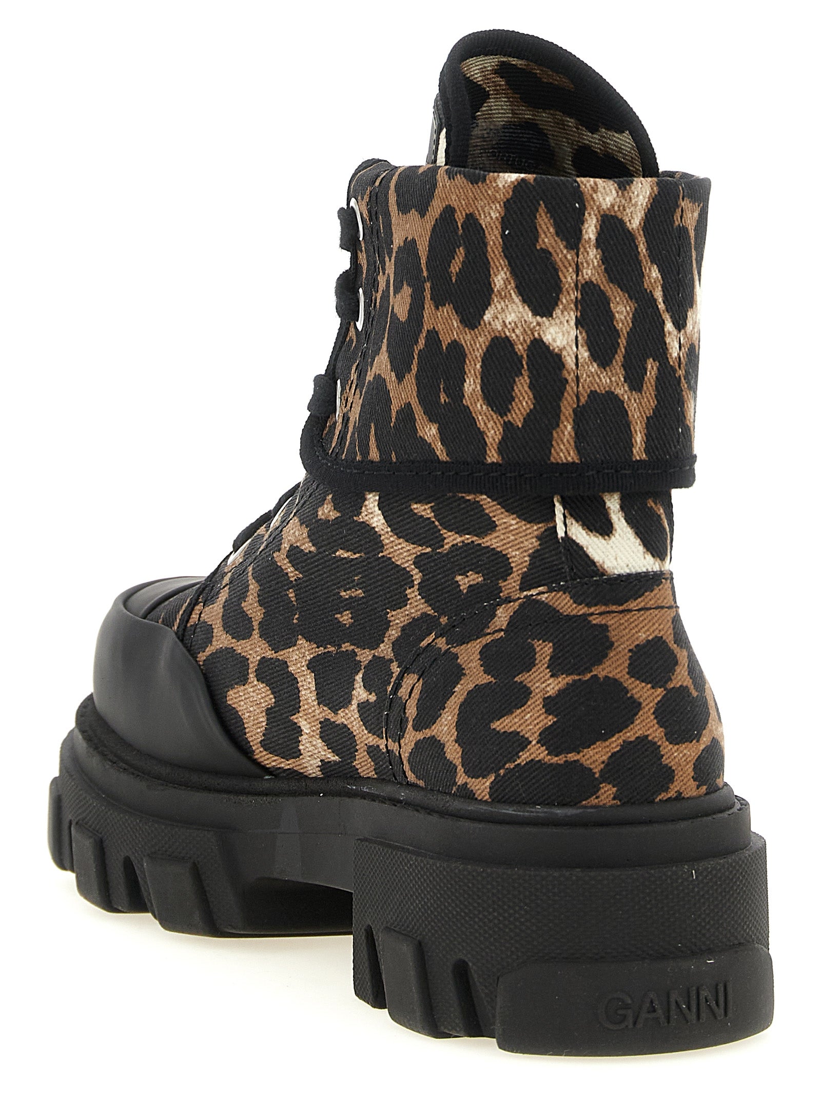 Lace-Up Ankle Boots by Ganni for women in stretch denim cotton black, multicolor, silver, leopard-print & print features an high-performance silhouette, showcasing the sophisticated design of the 9 To 5 Women's Stretch Denim Cotton Lace-Up Ankle Boots with a and a refined .