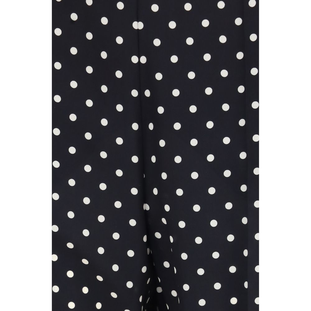 Trousers by Valentino Garavani for women in silk black & patterned features a artisanal silhouette, showcasing a sophisticated straight-leg, regular-fit & cropped with a cropped and for a artisanal finish.