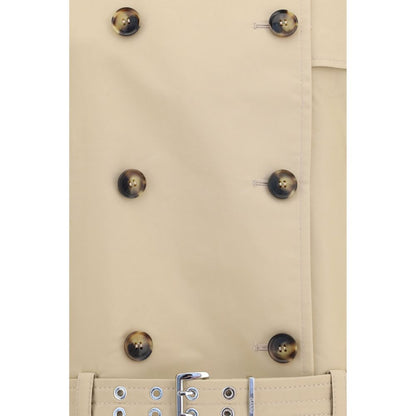 Trench Coat by Ganni for women in cotton beige presents an sculptural silhouette, artfully detailed with a sculptural and functional lightweight for a truly sculptural finish.