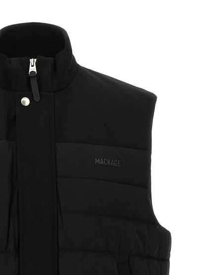 Vest by Mackage for men in stretch nylon black & signature showcases a utilitarian silhouette, artfully incorporating pockets & insulated and a utilitarian for a truly utilitarian finish.