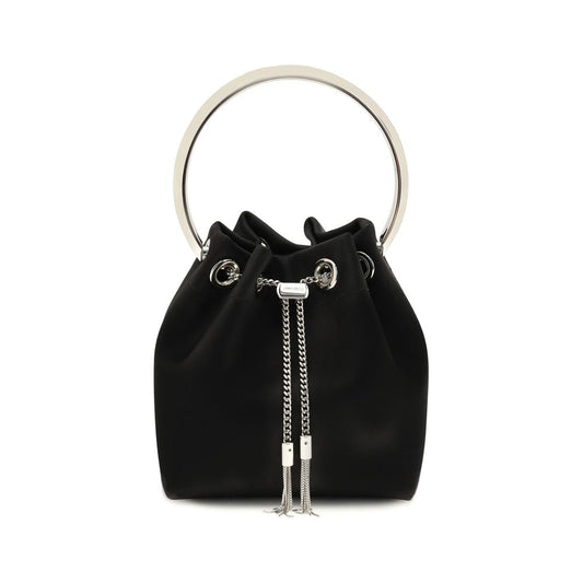 Bucket Shoulder Bag by Jimmy Choo for women in polyurethane & silk black features a effortless chic silhouette with a secure drawstring, ample , and versatile handle for a effortless chic finish.