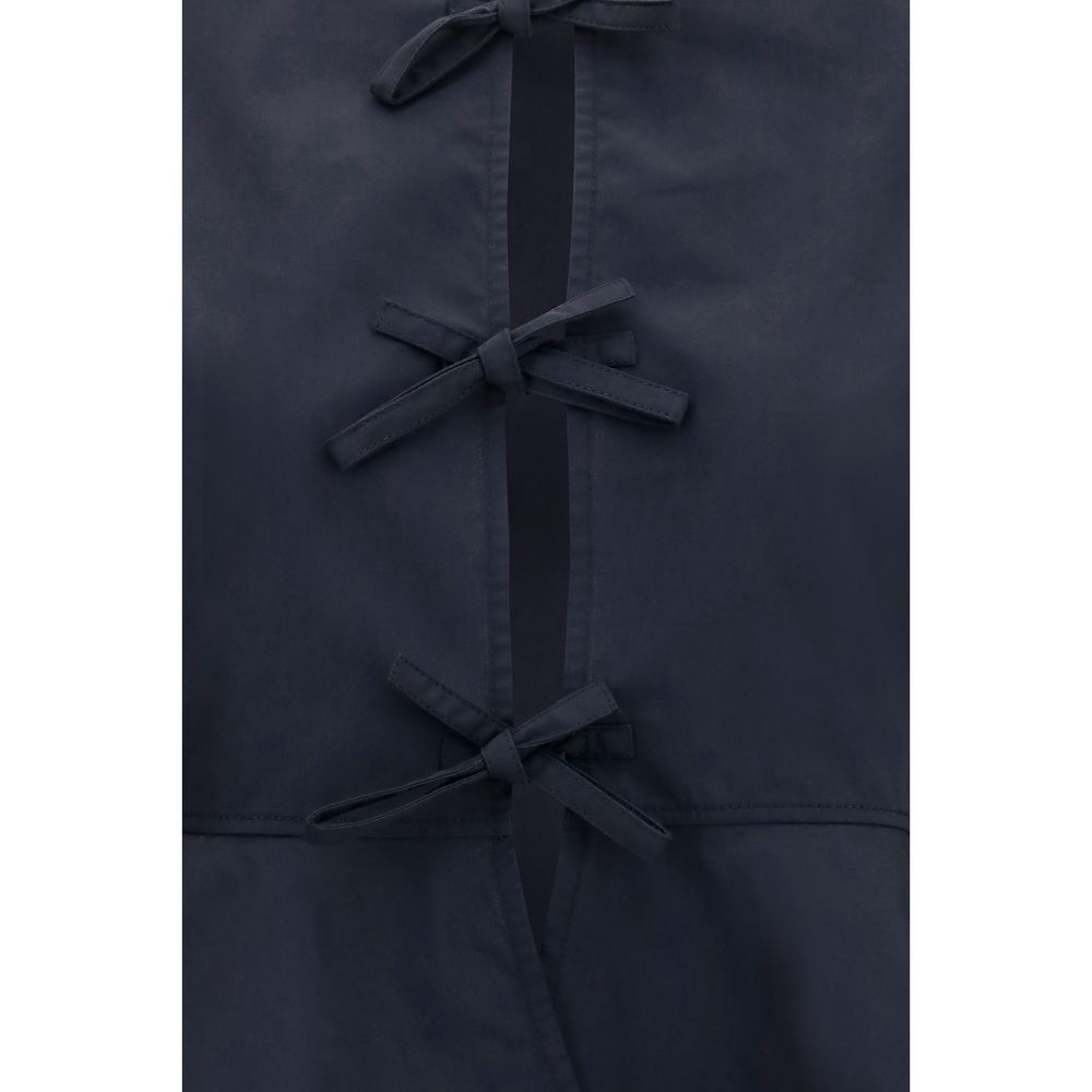 Blouse by Ganni for women in cotton black showcases a sublime silhouette, artfully detailed with a sublime and for a sophisticated, sublime finish.
