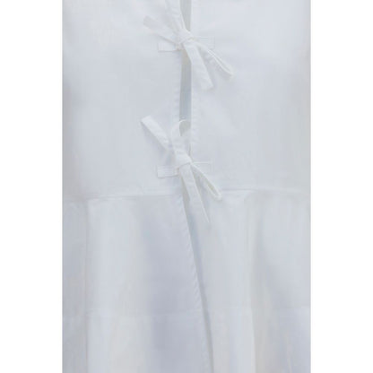 Blouse by Ganni for women in cotton white showcases a sleek silhouette, elegantly detailed with a sleek and for a sleek finish.