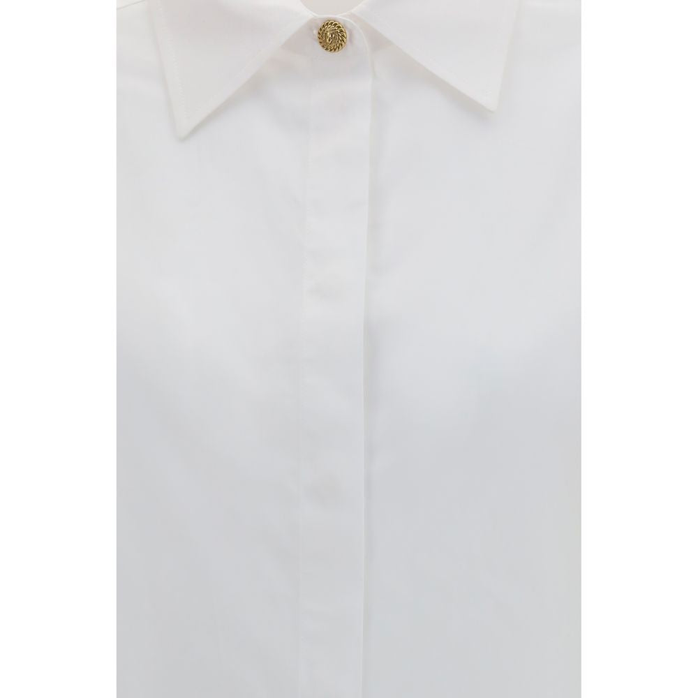 Dress Shirt by Balmain for women in cotton gold, white & signature features an architectural silhouette with a refined and elegant for a architectural look.