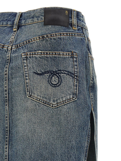 Skirt by R13 for women in cotton denim blue features an tailored silhouette, artfully capturing the essence of Devon Women's Denim Cotton Skirt in a sophisticated mini.