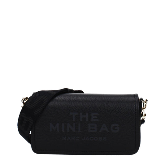 Mini Crossbody Handbag by Marc Jacobs for women in leather black features a transformative sophistication silhouette, showcasing a secure magnetic, ample built-in-compartments & cardholder, and versatile crossbody-strap, shoulder-strap & adjustable-strap for a transformative sophistication look.