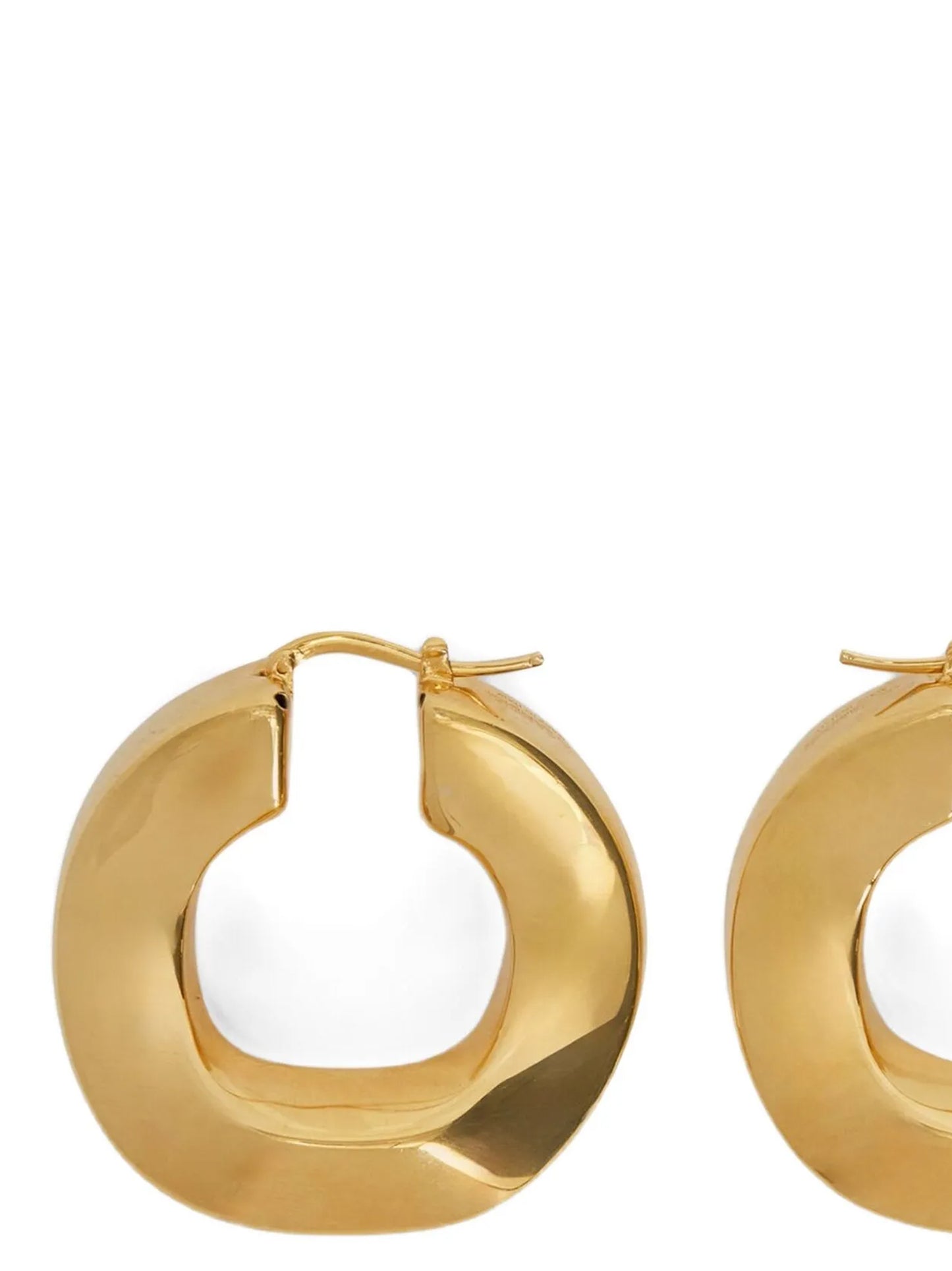 Earrings by Jil Sander for women in silk cotton & polyamide copper, gold & hooped showcases a artisanal silhouette, artfully capturing the essence of Women's Hoop Gold Copper Earrings with its exquisite hoop.