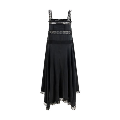 Dress by Ganni for women in viscose silk black presents a sinuous silhouette, showcasing a sophisticated square neckline and detailed with a sinuous maxi long for a refined finish.